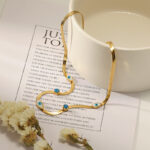 Gilded Evil Eye Herringbone Choker